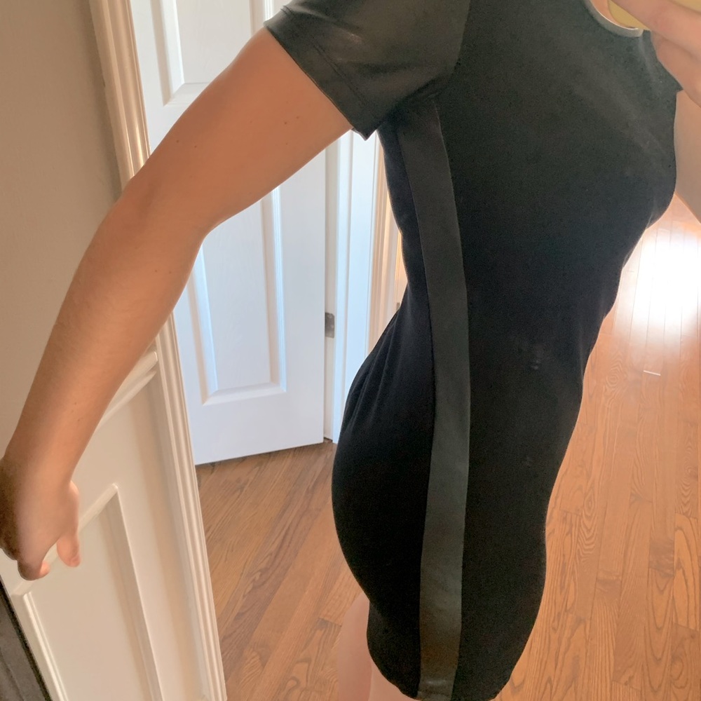 Black mini dress with leather shoulders